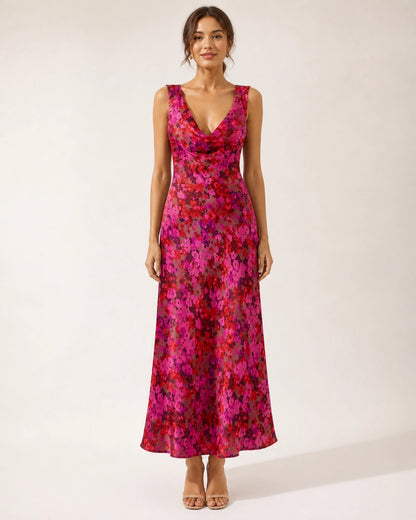 Women's pink floral sleeveless cowl-neck bias-cut maxi dress, full front silhouette.
