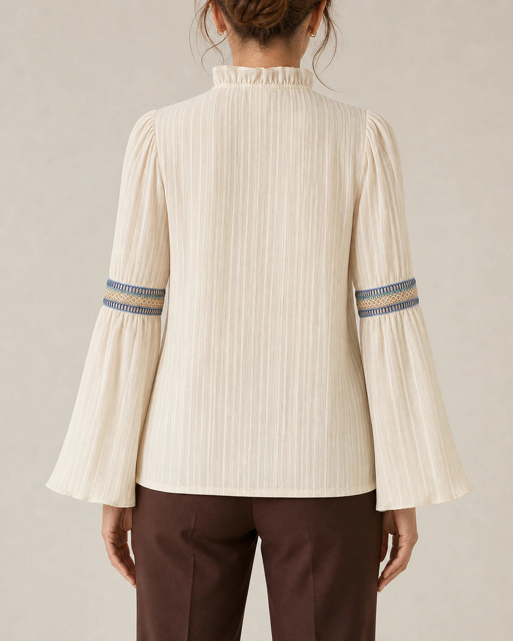 Women's ivory vintage blouse, rear fit view.