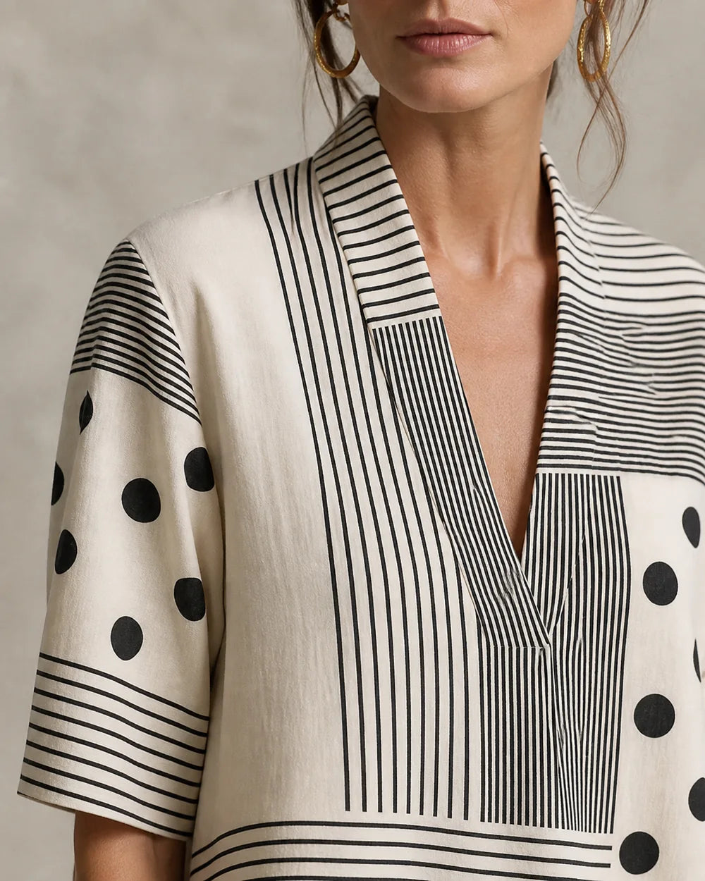 Striped polka-dot top neckline and fabric detail
